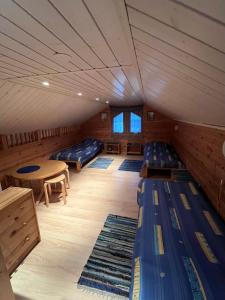 En eller flere senge i et værelse på Cottage Petra in Koli