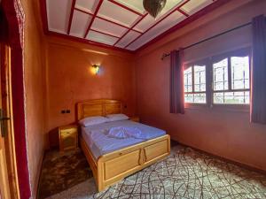 Riad Restaurant MARZOUK客房内的一张或多张床位