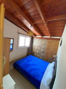 A bed or beds in a room at Nikos Studios Meltemi Family Suite Penthouse