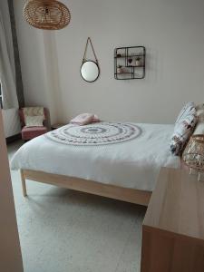 Giường trong phòng chung tại Gîte Le Salmon