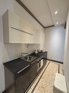 Kuchyň nebo kuchyňský kout v ubytování Palazzo Mari suite & rooms b&b