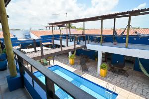 an overhead view of a building with a swimming pool at Pousada Costa Prestige in Touros
