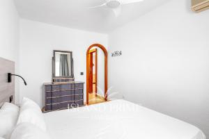 a bedroom with a dressing table and a mirror at 2x bedrooms Heated Pool Holiday in Amarilla Golf FC2613-2xE in San Miguel de Abona +16 photos