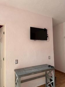 TV a/nebo společenská místnost v ubytování Casa Eva