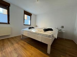 Postel nebo postele na pokoji v ubytování 2 Zimmer Apartment mit kostenlosem Parkplatz