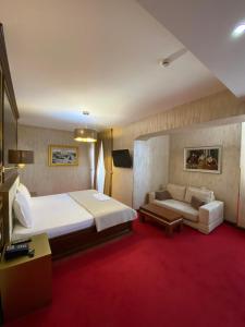 Katil atau katil-katil dalam bilik di Rozafa Hotel