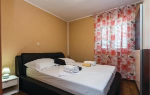 Posteľ alebo postele v izbe v ubytovaní Four-Bedroom Holiday Home In Pristeg