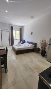 Postel nebo postele na pokoji v ubytování Experience New Apartments Golem