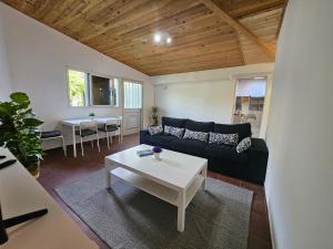 a living room with a couch and a table at Casa Erika in Hermigua