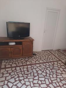 TV a/nebo společenská místnost v ubytování Nina Apartments