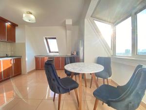 Η κουζίνα ή μικρή κουζίνα στο Stan u strogom centru grada