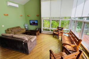 TV a/nebo společenská místnost v ubytování ILHABEACH HOUSE São Sebastião