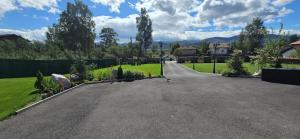 a driveway in a house with a fence at Villa Malevitsa Вила Малевица in Relyovo