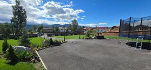 a basketball hoop in the middle of a park at Villa Malevitsa Вила Малевица in Relyovo