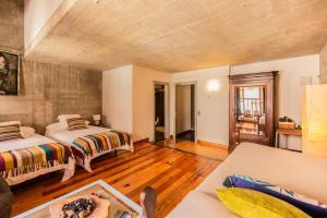 A bed or beds in a room at Loft Rural LaCalata