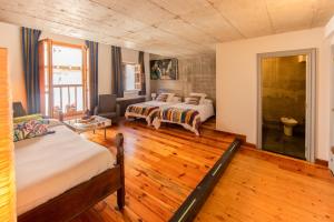 A bed or beds in a room at Loft Rural LaCalata
