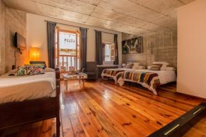 A bed or beds in a room at Loft Rural LaCalata