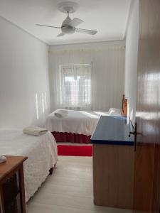 Łóżko lub łóżka w pokoju w obiekcie Villa Entre Encinas