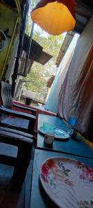 Posezení v ubytování Sinhassan Dormitory Hostel Juhu