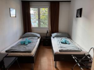 Postel nebo postele na pokoji v ubytování Altstadt Gästehaus + 31 fotografií