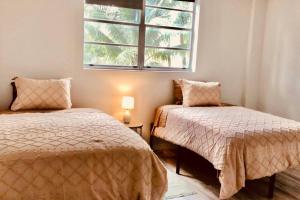 Postel nebo postele na pokoji v ubytování SIAN private Apartments + 38 fotografií