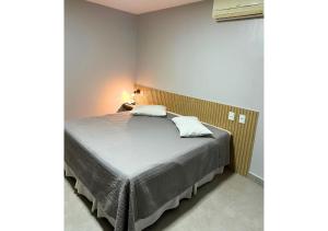 a bedroom with a bed in a room at Brasília Park Hotel in Brasilia