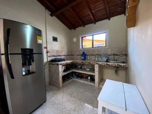 Kuchyň nebo kuchyňský kout v ubytování Central y Cómoda casa San Rafael Wifi y Balcón