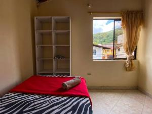 Postel nebo postele na pokoji v ubytování Central y Cómoda casa San Rafael Wifi y Balcón