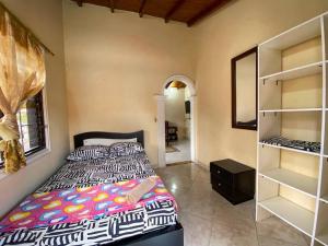 Postel nebo postele na pokoji v ubytování Central y Cómoda casa San Rafael Wifi y Balcón