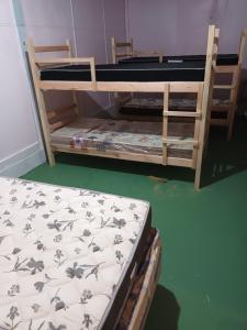 Postel nebo postele na pokoji v ubytování Hostel Espaço Mulher