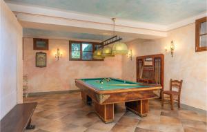a living room with a pool table in it at Villa Monte Bottigli in Grosseto +49 photos