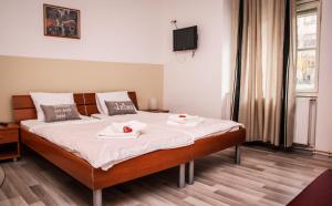 Posteľ alebo postele v izbe v ubytovaní Rooms Eliza