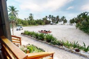 a group of people in a boat on the beach at Special Offer Oceanfront Private Estate By Alom in San Pedro +96 photos