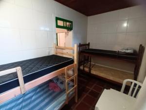 Postel nebo postele na pokoji v ubytování Hostel Espaço Mulher