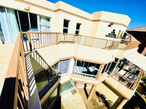 an aerial view of a house with a balcony at Hotel Vibes Cape Town Plattekloof in Cape Town