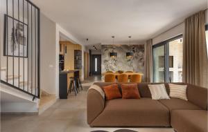 a living room with a couch and a table at Villa Libreto in Vošteni