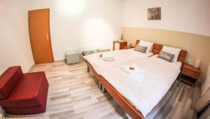 Posteľ alebo postele v izbe v ubytovaní Rooms Eliza