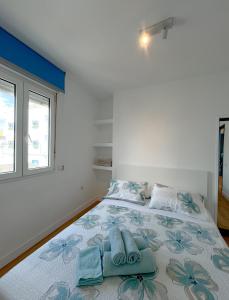 Postel nebo postele na pokoji v ubytování Casa Dante Corralejo + 5 fotografií