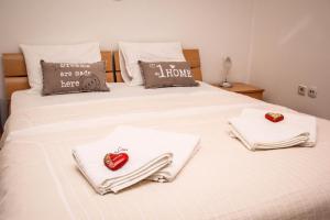 Posteľ alebo postele v izbe v ubytovaní Rooms Eliza