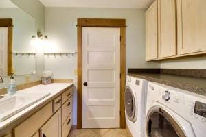 a laundry room with a washer and dryer at 5 Mi to Whitefish Resort Minutes to Chairlifts! in Whitefish