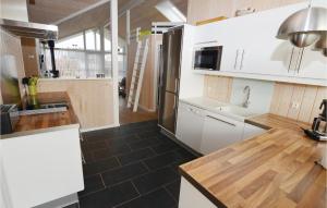 Η κουζίνα ή μικρή κουζίνα στο Holiday Home Strandparken Otterup Ii