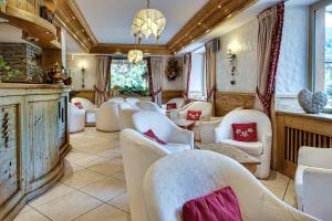Posezení v ubytování Hotel les Sapins