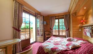 Postel nebo postele na pokoji v ubytování Hotel les Sapins