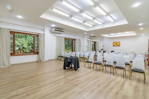 a conference room with a table and chairs in it at Villagio Embu Resort & Convention in Embu +102 photos
