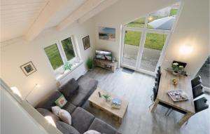 an overhead view of a living room with a couch and a table at 2 Bedroom Amazing Home In Dagebüll in Dagebüll