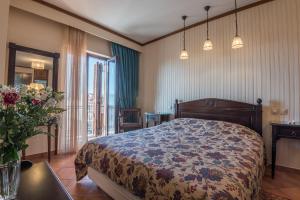 Ένα ή περισσότερα κρεβάτια σε δωμάτιο στο Marianna's Home Accommodation
