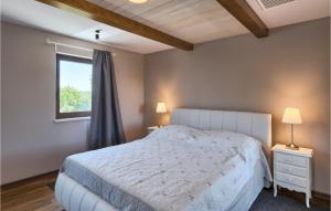 Postel nebo postele na pokoji v ubytování Villa Rea