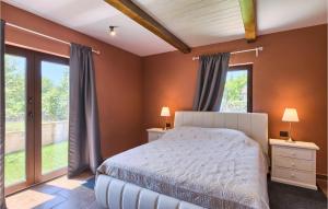 Postel nebo postele na pokoji v ubytování Villa Rea