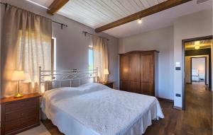 Postel nebo postele na pokoji v ubytování Villa Rea