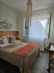 Кровать или кровати в номере VILLA VILLACOLLE
